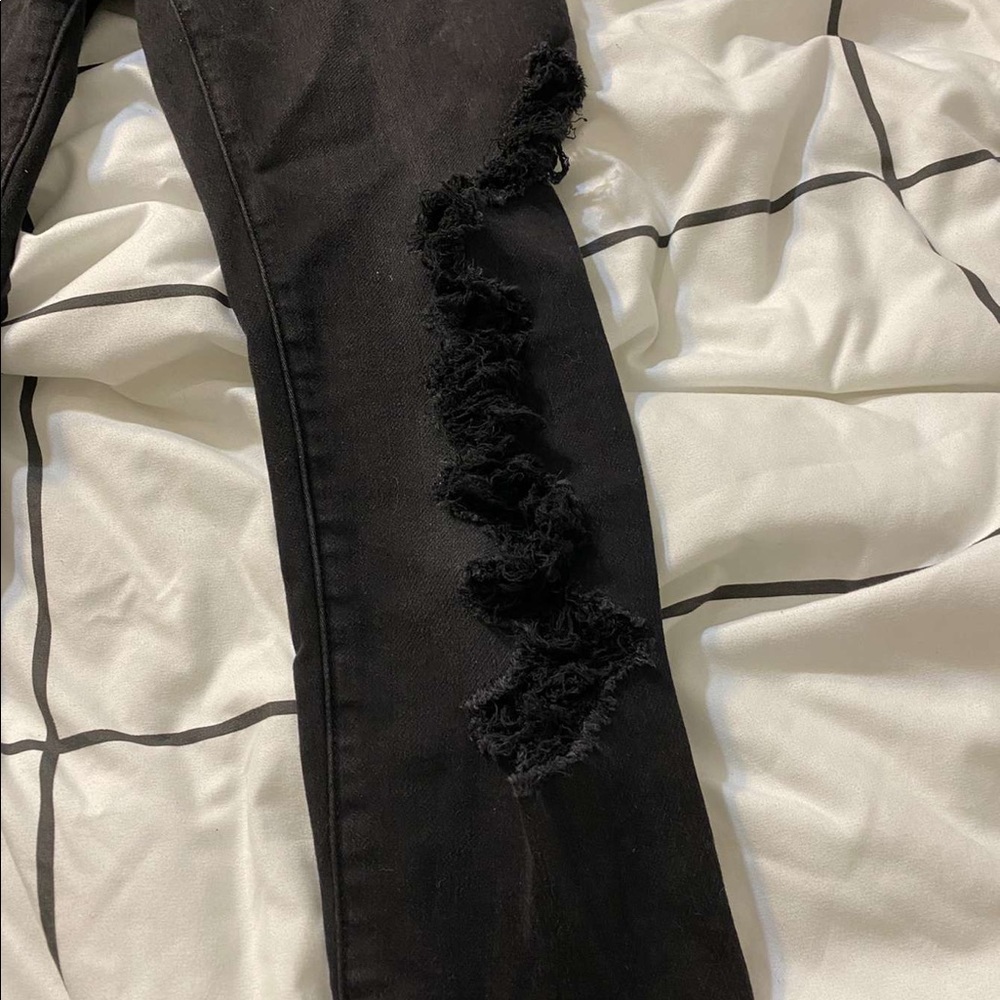 Black ripped American Eagle jeans